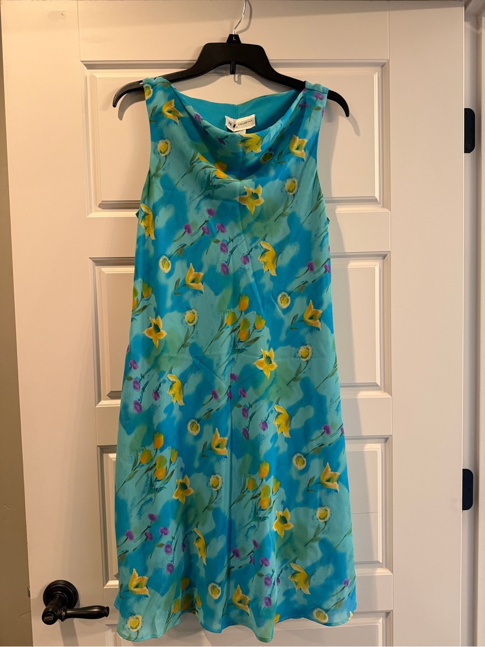 S.L. Fashions Turquoise Label